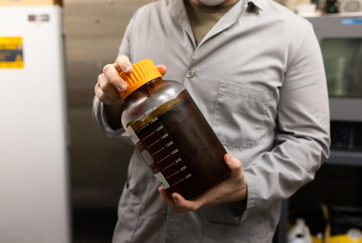 Texas Original Director of Operations Todd Harris holds a jar of cannabis oil on Sept. 26, 2024. Legally, only certain percentages of CBD and THC can be found in their products to be sold.